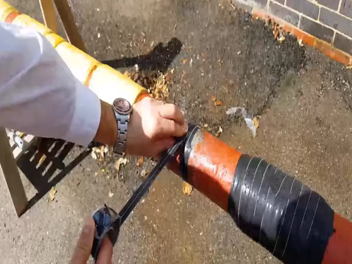 Targeted leak repair being performed on a copper pipe in a Portland home